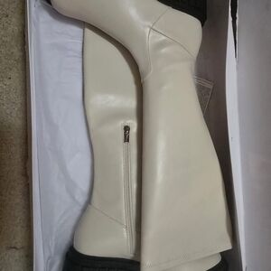 The DROP. Elegant Cream Heeled Boots.